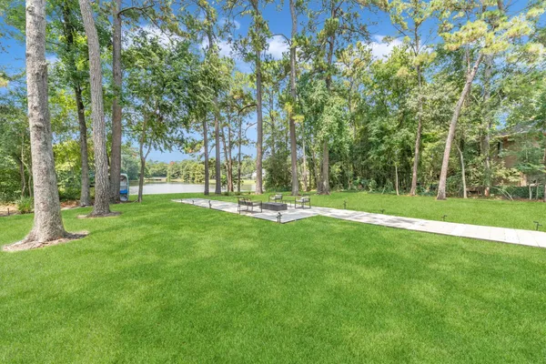 a garden view with a fountain