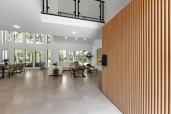 a lobby with furniture and rug