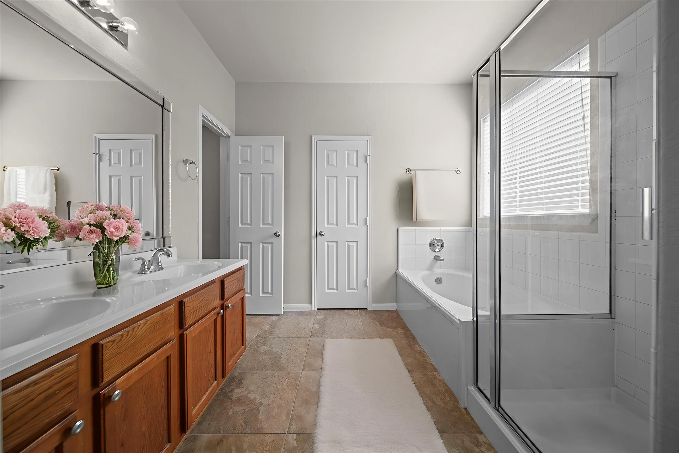 6047 Northcrest Village Way Spring, TX 77388 - Photo 15 of 30 Digitally staged primary bathroom to show use of space & design potential.