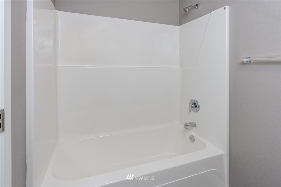 10503 Angeline Road East Bonney Lake, WA 98391 - Photo 31 of 38 a close up of a bathtub