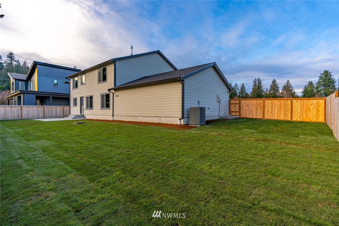 10503 Angeline Road East Bonney Lake, WA 98391 - Photo 36 of 38 a house view with a garden space