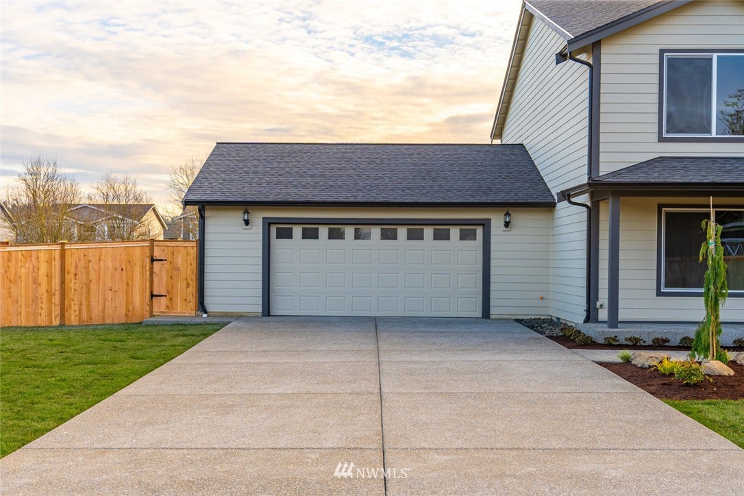 10503 Angeline Road East Bonney Lake, WA 98391 - Photo 4 of 38 a house view with a garden space
