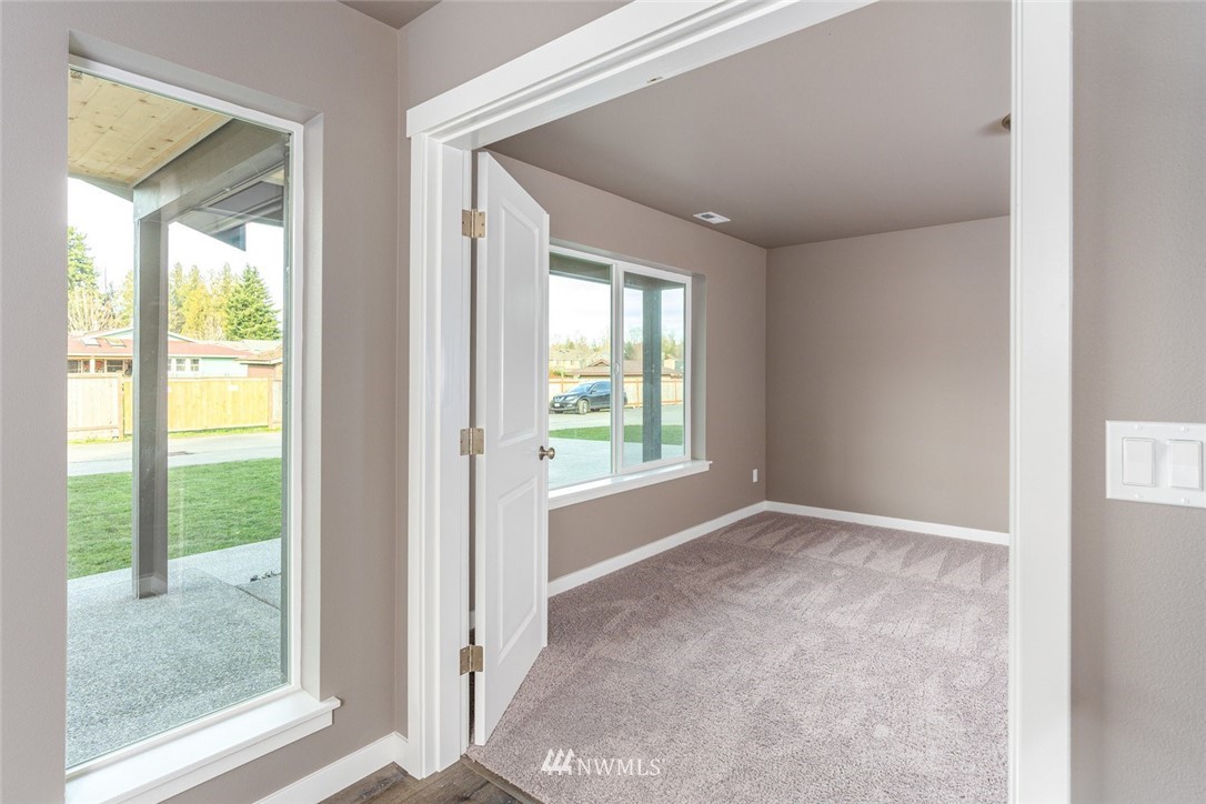 10503 Angeline Road East Bonney Lake, WA 98391 - Photo 6 of 38 a view of an empty room and window