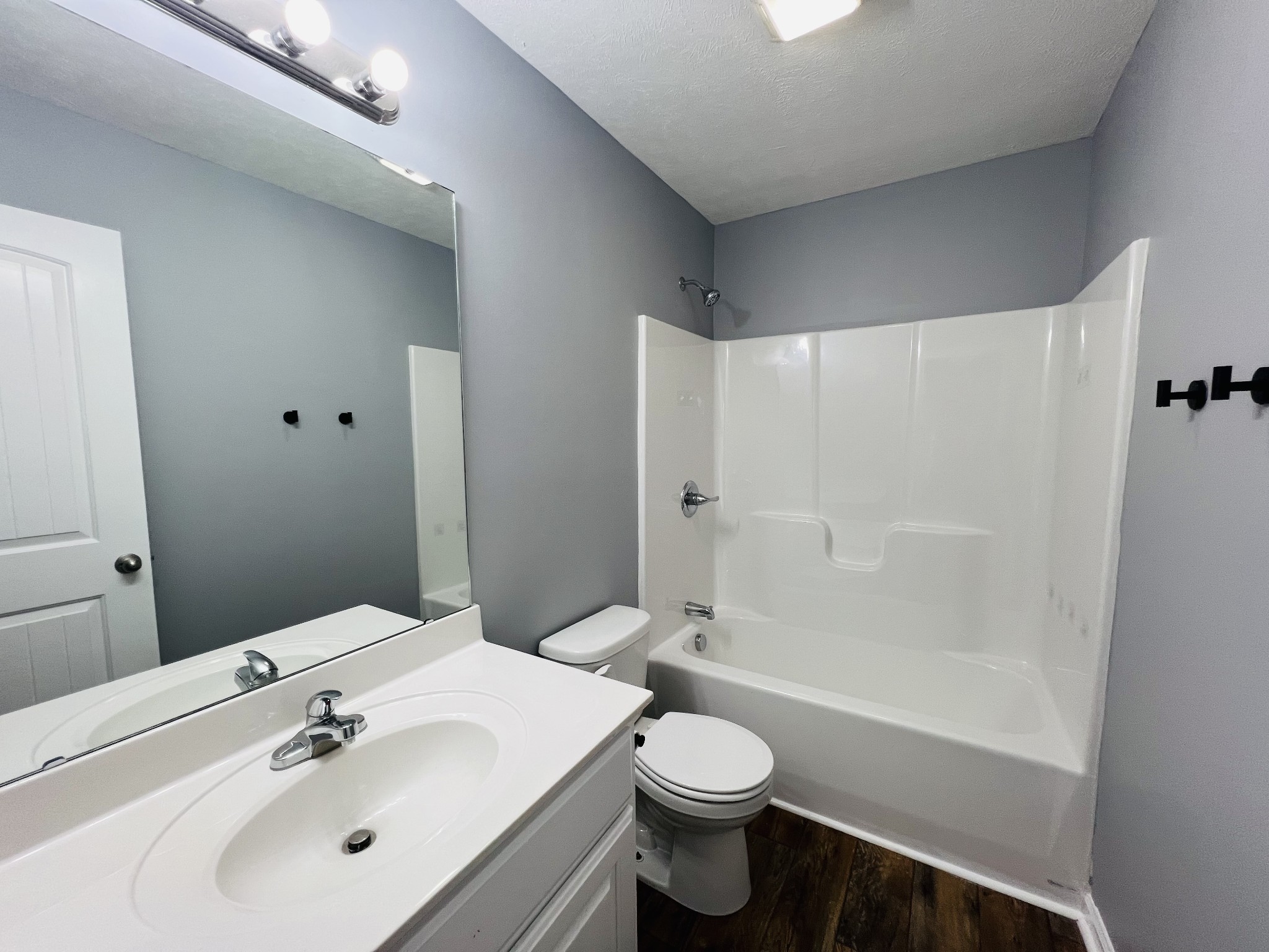 770 Bunker Hill Road Pulaski, TN 38478 - Photo 17 of 26 a bathroom with a sink toilet and shower