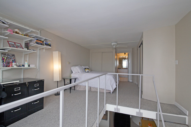 1221 North Dearborn Parkway, Unit 1601N Chicago, IL 60610 - Photo 19 of 21 a view of a hallway with workspace