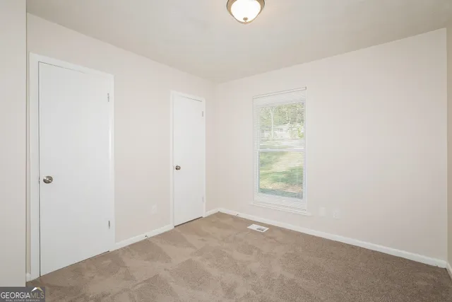 an empty room with a window