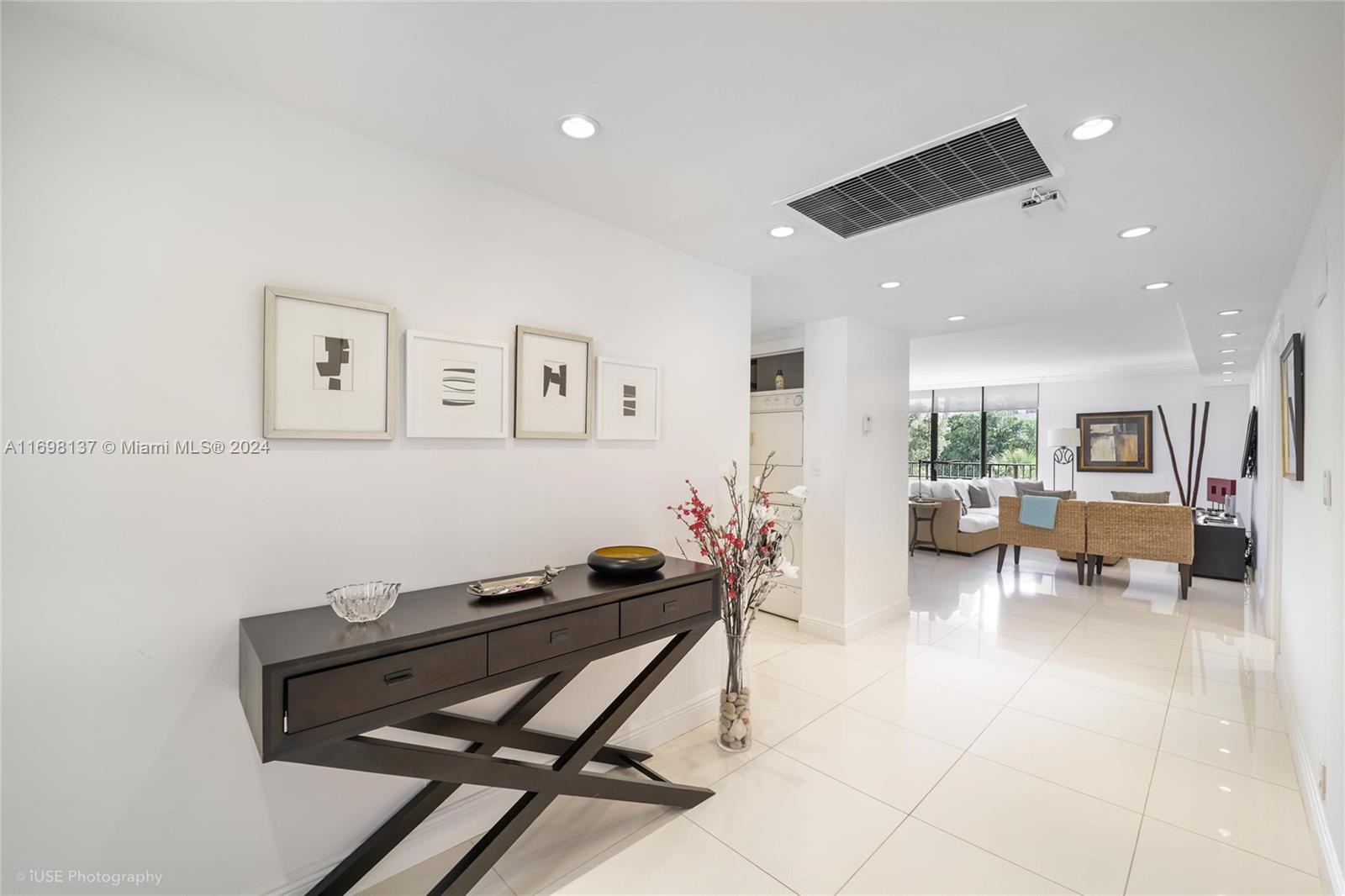 Key Biscayne Key Biscayne, FL 33149 - Photo 1 of 12 a living room with furniture and a table