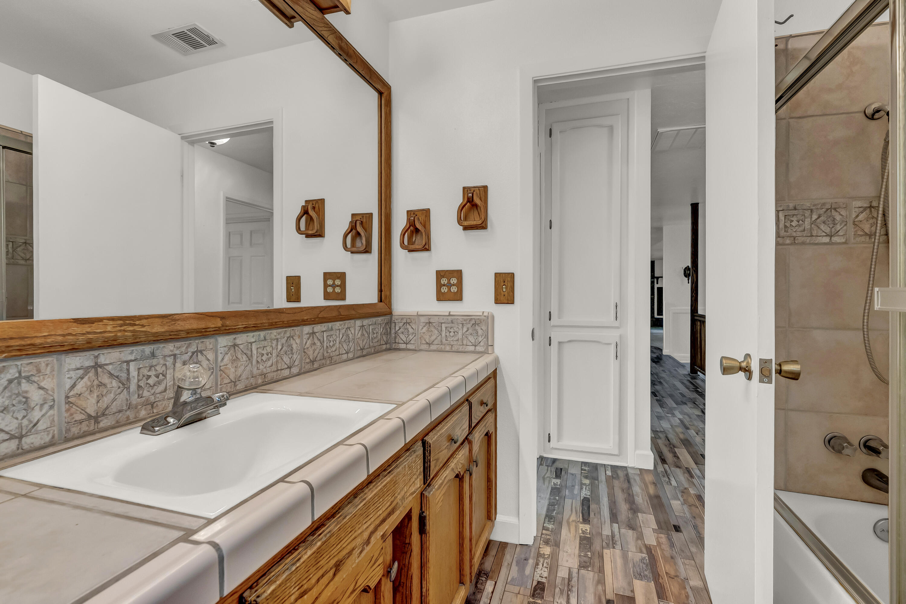 18002 320th Road Springville, CA 93265 - Photo 36 of 56 a bathroom with a sink and a mirror