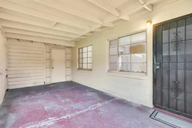 a view of a porch with furniture