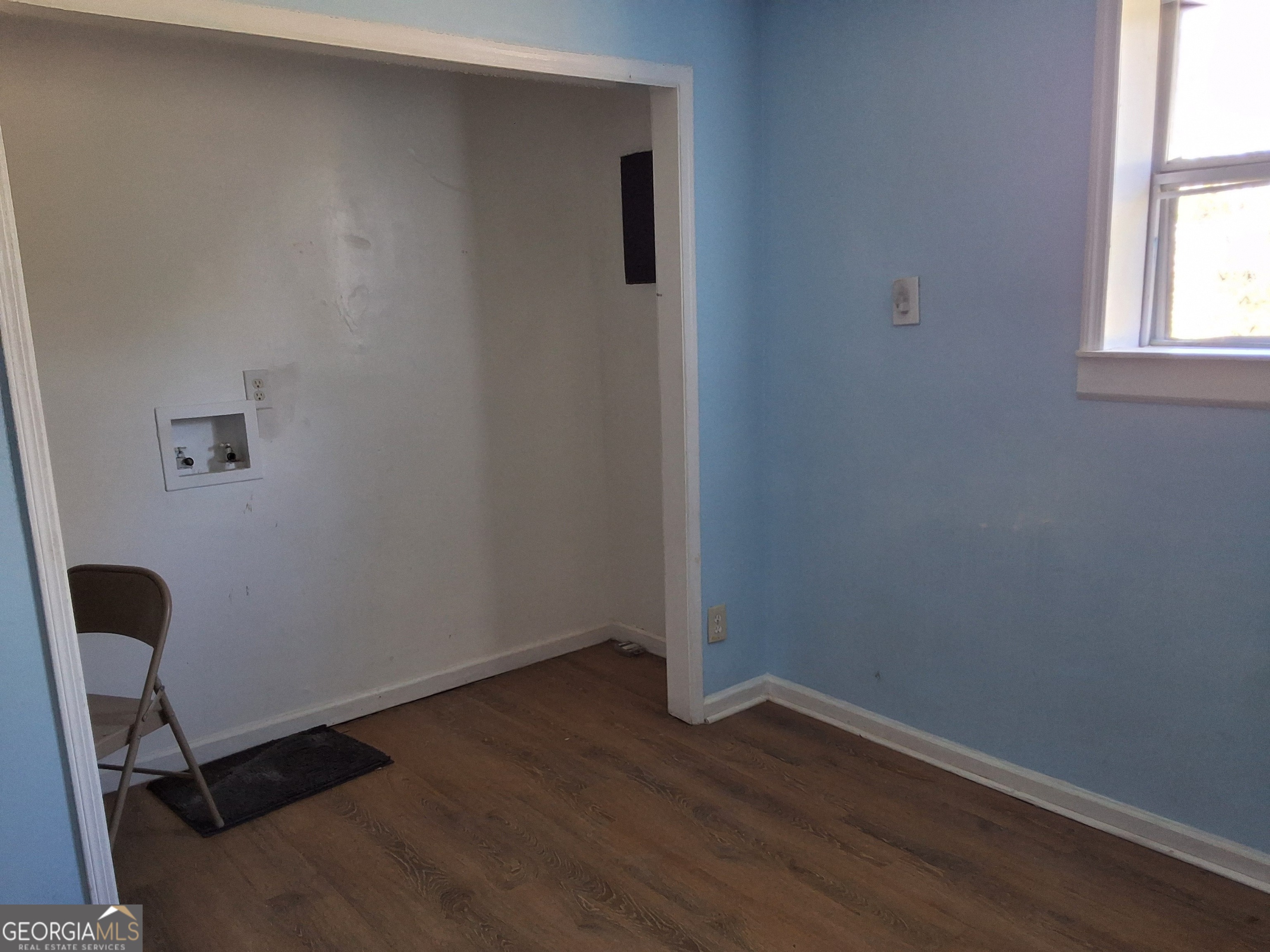 745 Pebble Street Macon, GA 31201 - Photo 5 of 10 a view of workspace with wooden floor windows
