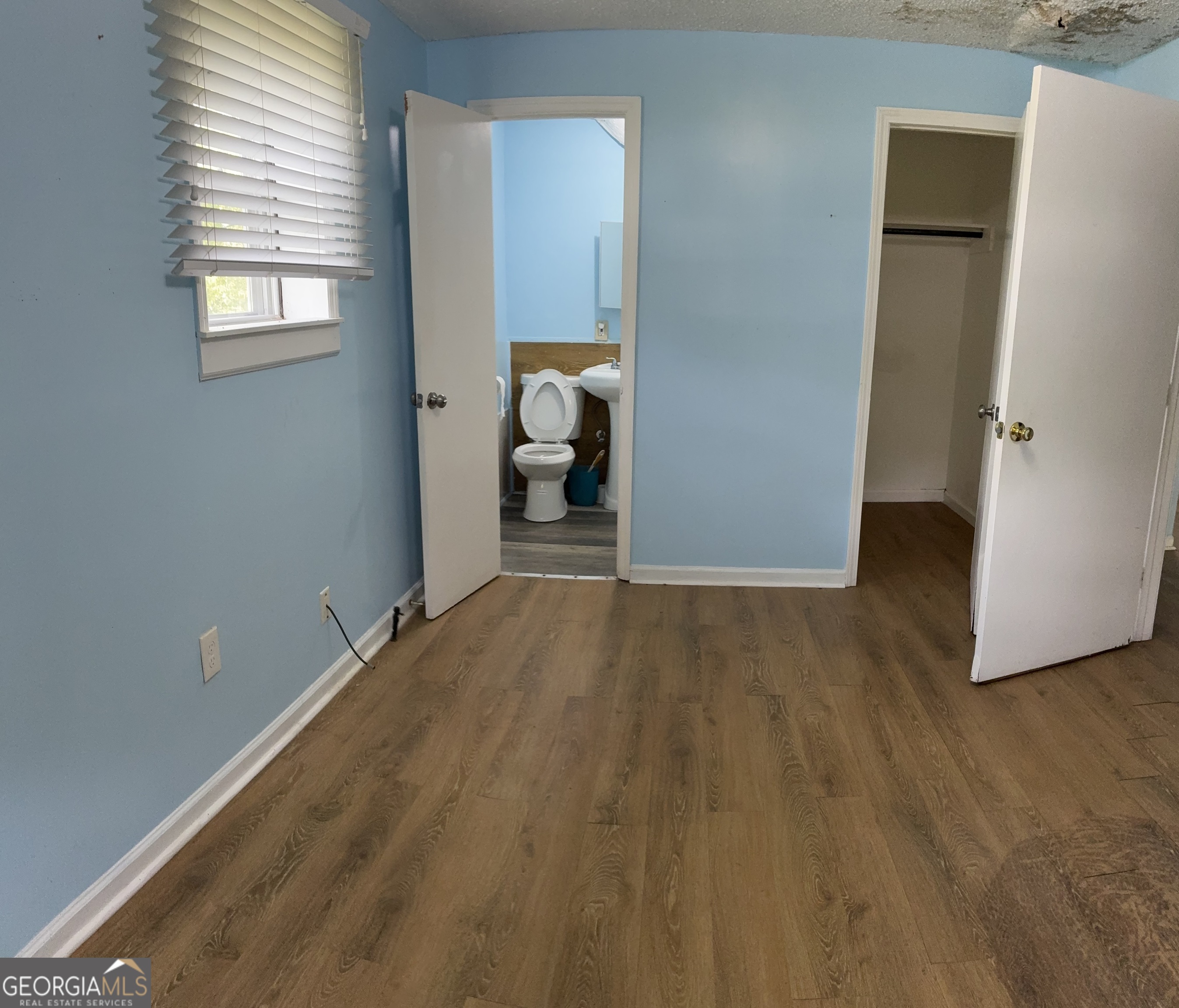 745 Pebble Street Macon, GA 31201 - Photo 9 of 10 a view of a room with wooden floor