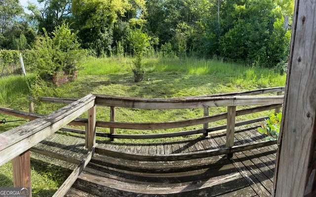 a view of swimming pool from a balcony