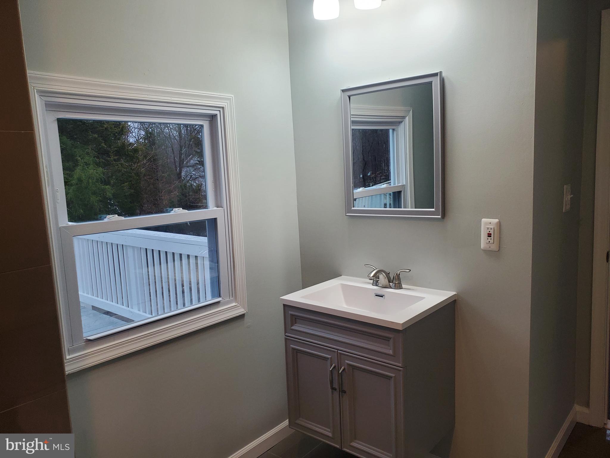 8136 Woodyard Road Clinton, MD 20735 - Photo 21 of 42 Attached Bathroom