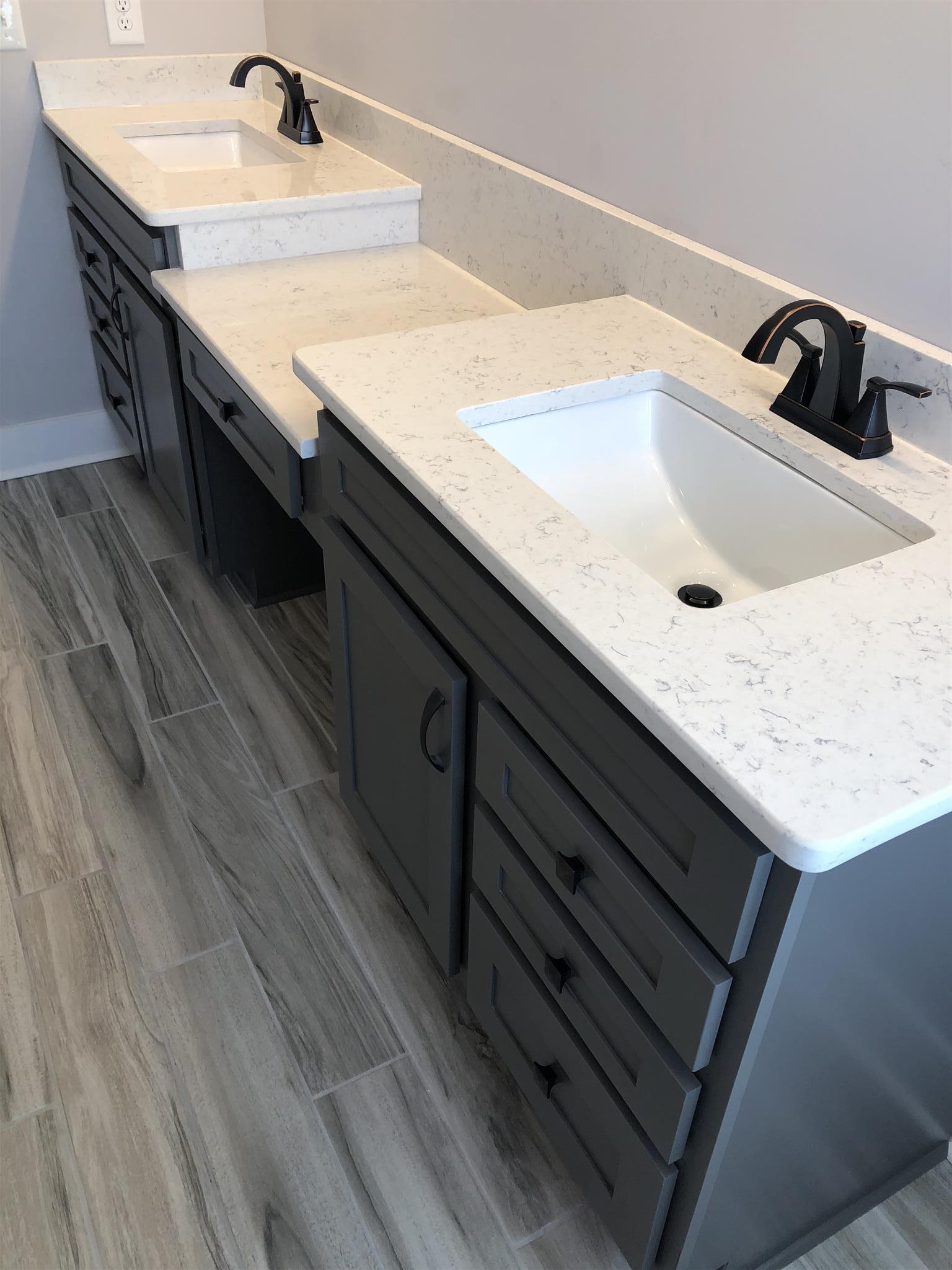 409 Halltown Road Cottontown, TN 37048 - Photo 14 of 25 a bathroom with a sink and a mirror