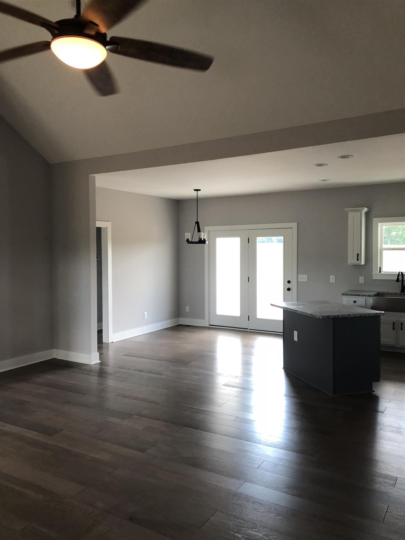409 Halltown Road Cottontown, TN 37048 - Photo 21 of 25 a living room with hard wood floors
