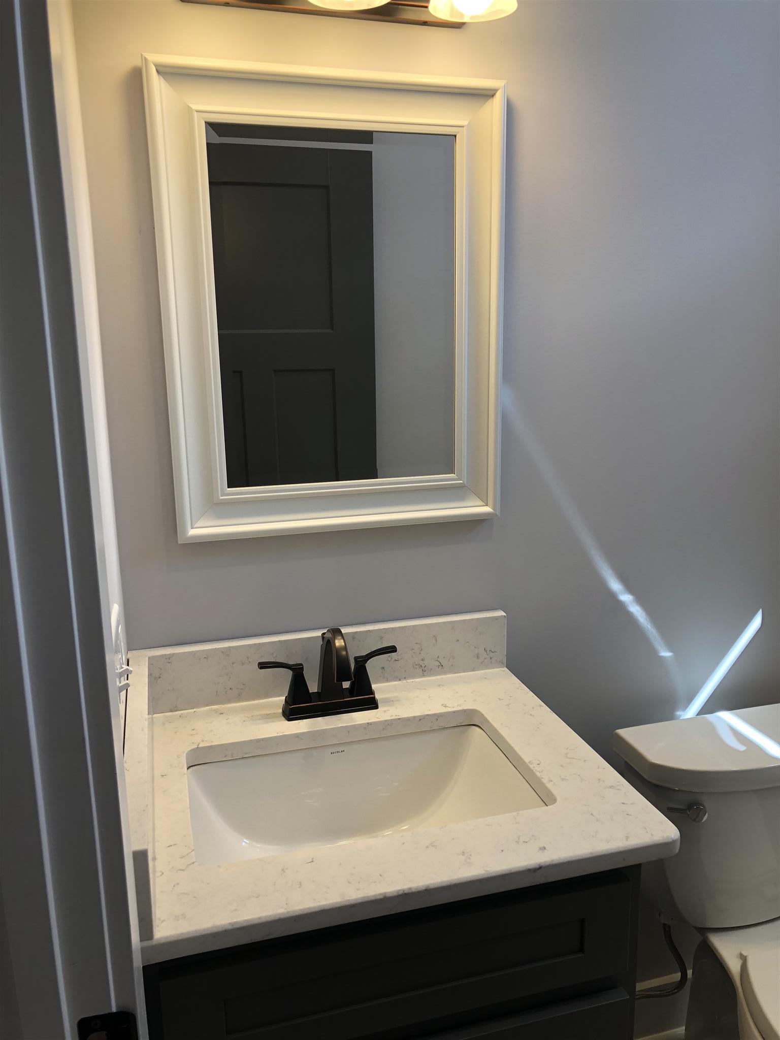 409 Halltown Road Cottontown, TN 37048 - Photo 8 of 25 a close view of a sink in a bathroom