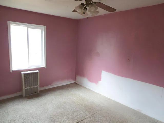 an empty room with a window