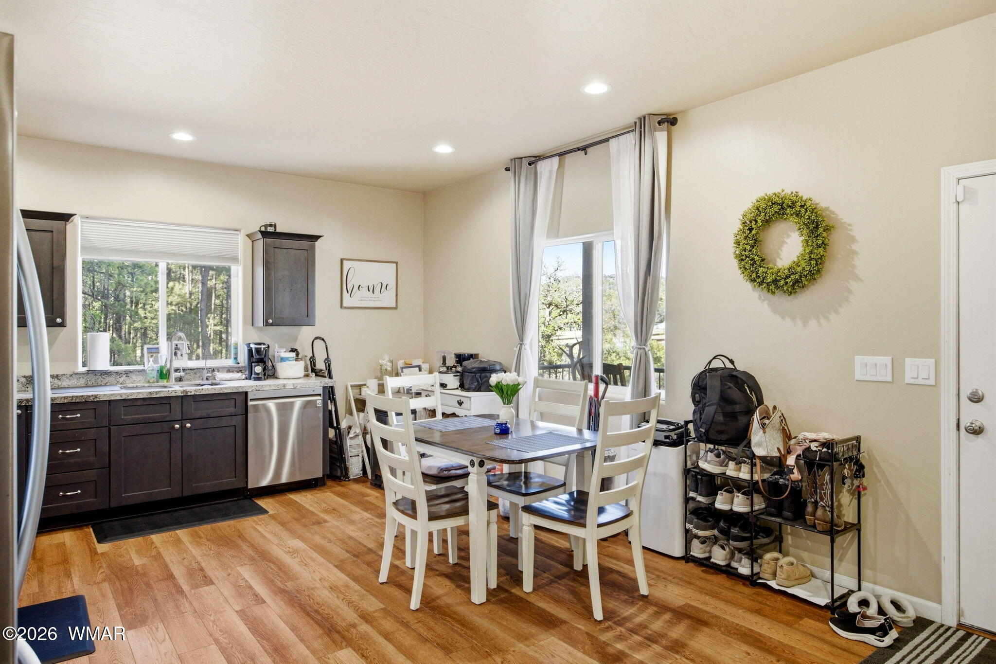 588 Rim Road Pinedale, AZ 85934 - Photo 13 of 30 a kitchen with a table and chairs in it