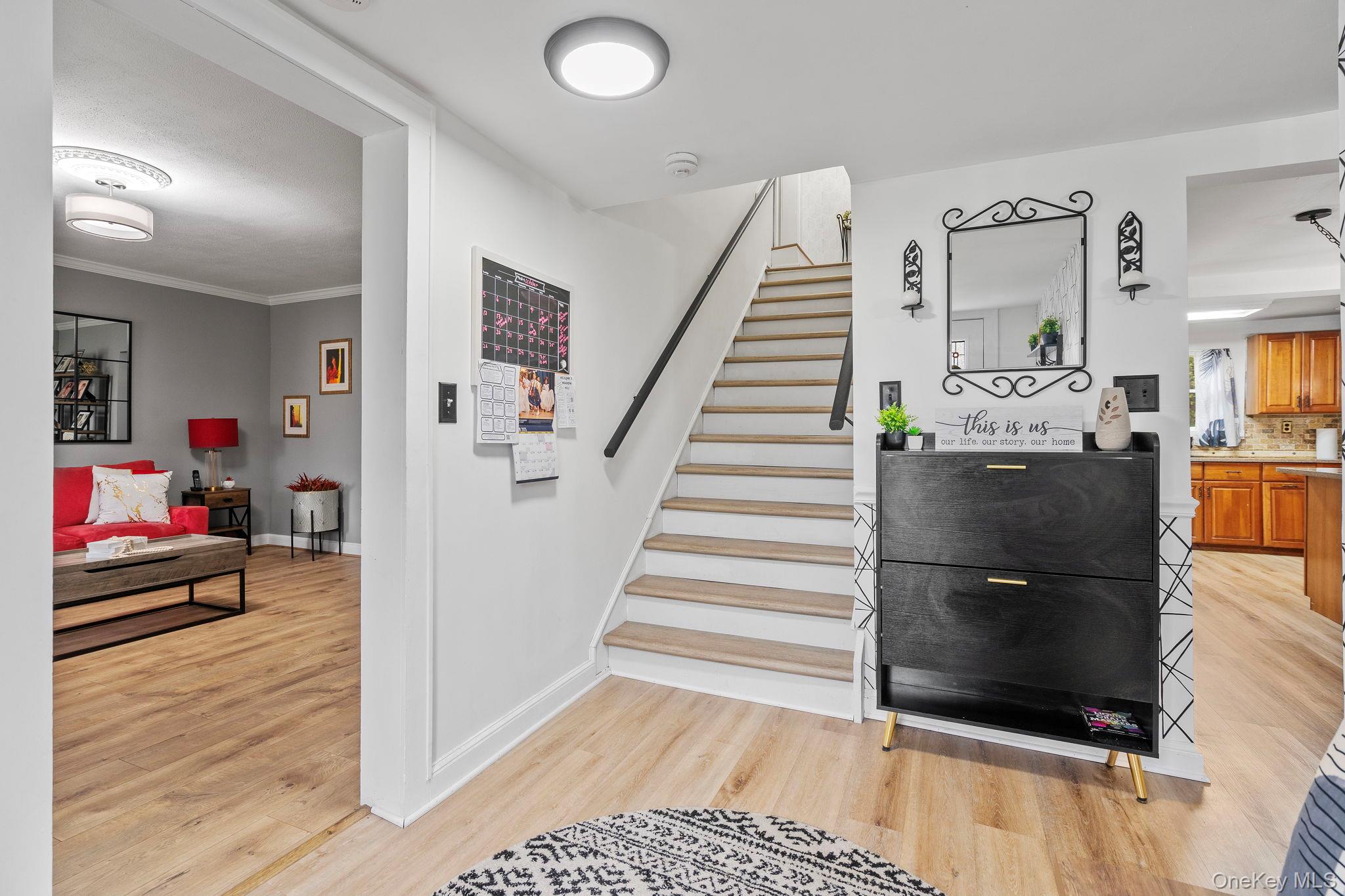 168 Fostertown Road Newburgh, NY 12550 - Photo 13 of 38 Stairs featuring wood finished floors and baseboards