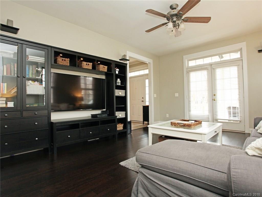 9399 Founders Street, Unit 164 Fort Mill, SC 29708 - Photo 17 of 36 a living room with furniture and a flat screen tv