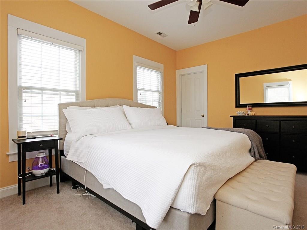 9399 Founders Street, Unit 164 Fort Mill, SC 29708 - Photo 19 of 36 a bedroom with a bed and window