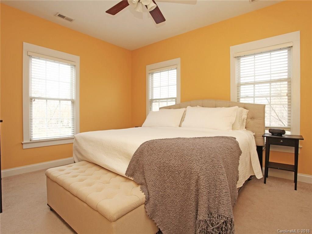 9399 Founders Street, Unit 164 Fort Mill, SC 29708 - Photo 20 of 36 a bedroom with bed and window