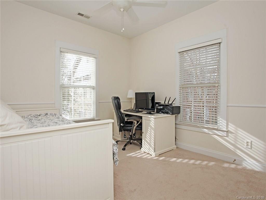 9399 Founders Street, Unit 164 Fort Mill, SC 29708 - Photo 24 of 36 a view of a workspace with furniture and a window