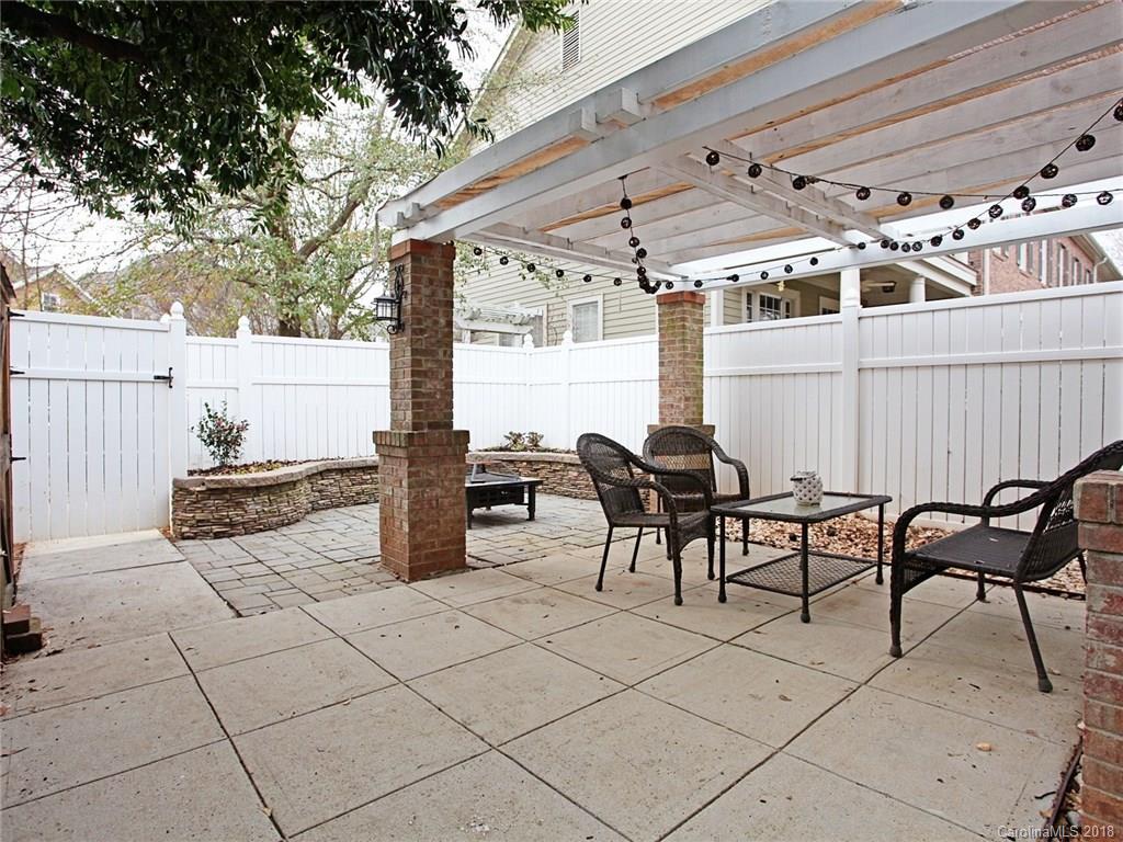 9399 Founders Street, Unit 164 Fort Mill, SC 29708 - Photo 28 of 36 a roof deck with table and chairs