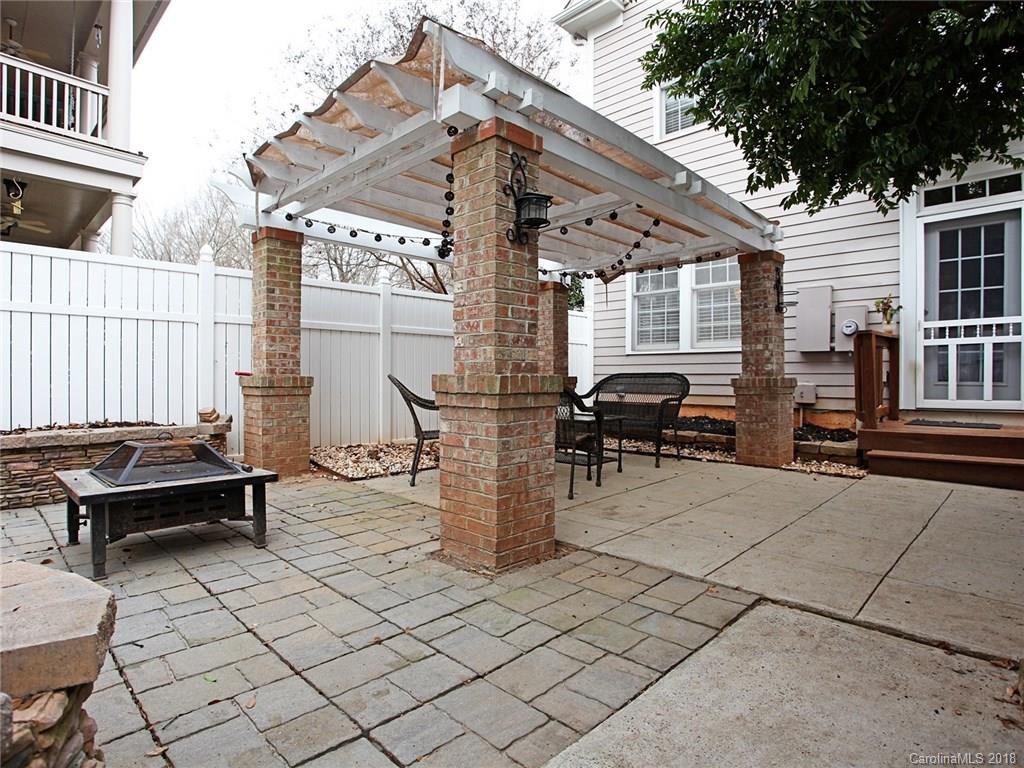 9399 Founders Street, Unit 164 Fort Mill, SC 29708 - Photo 29 of 36 a view of a patio with table and chairs