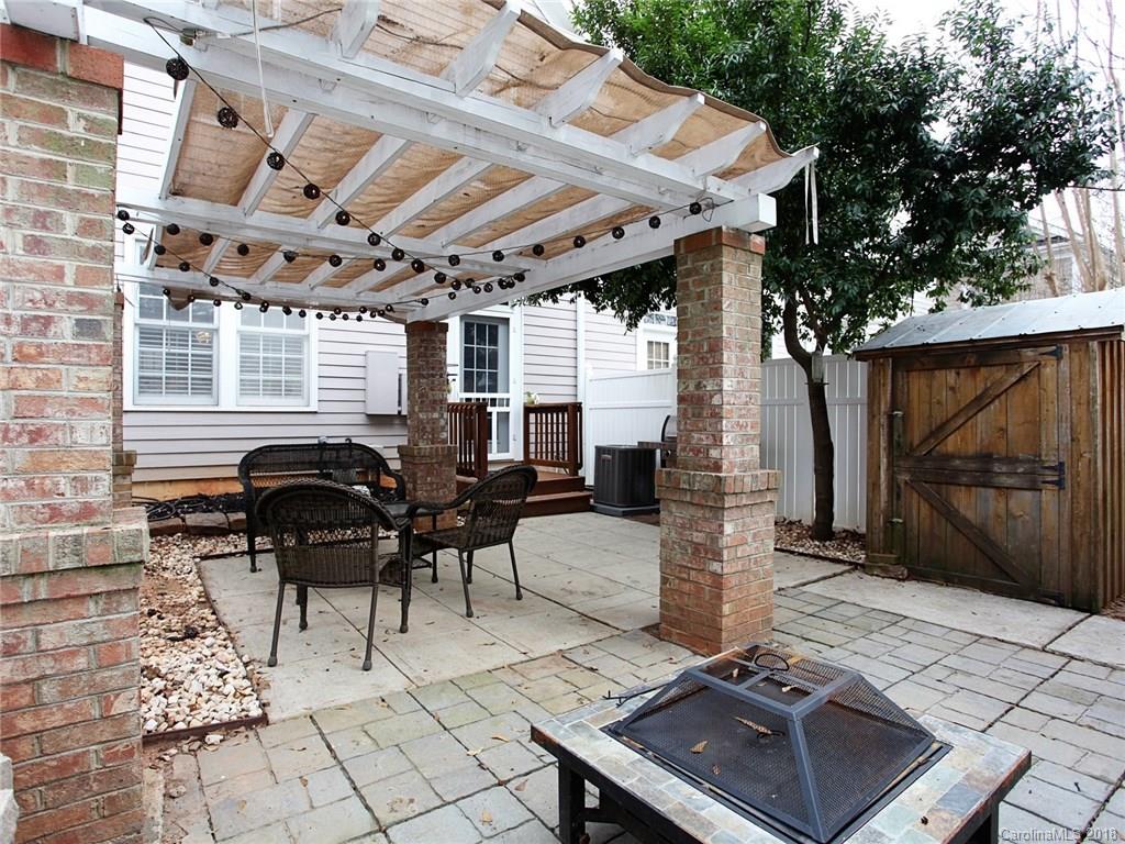 9399 Founders Street, Unit 164 Fort Mill, SC 29708 - Photo 30 of 36 a patio with table and chairs