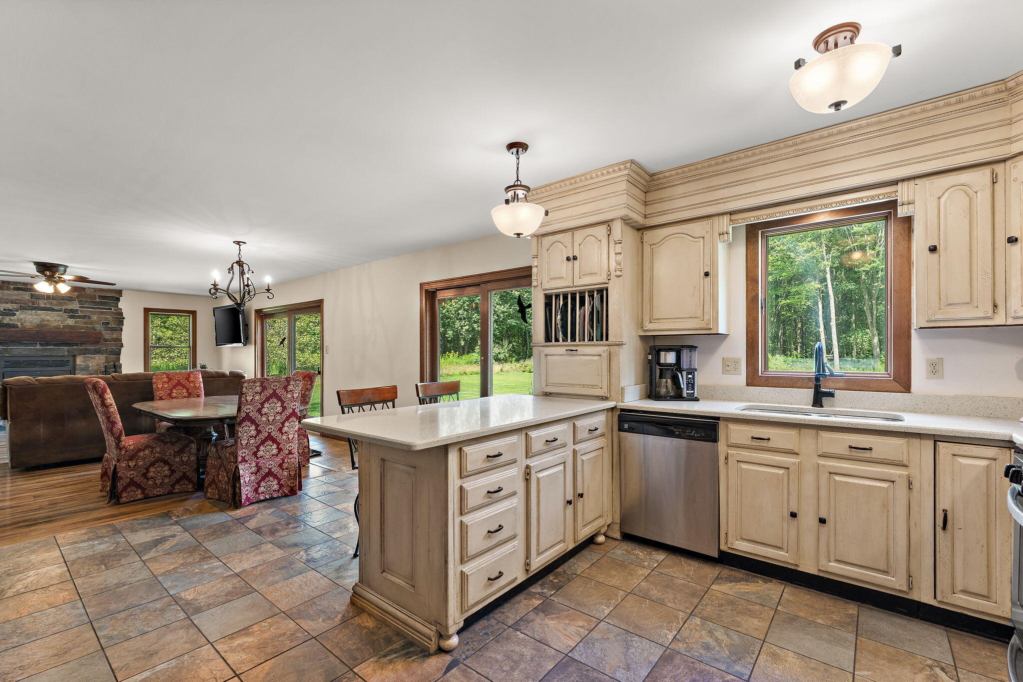 249 West 700 North Valparaiso, IN 46385 - Photo 16 of 46 a kitchen that has a lot of cabinets in it and stainless steel appliances