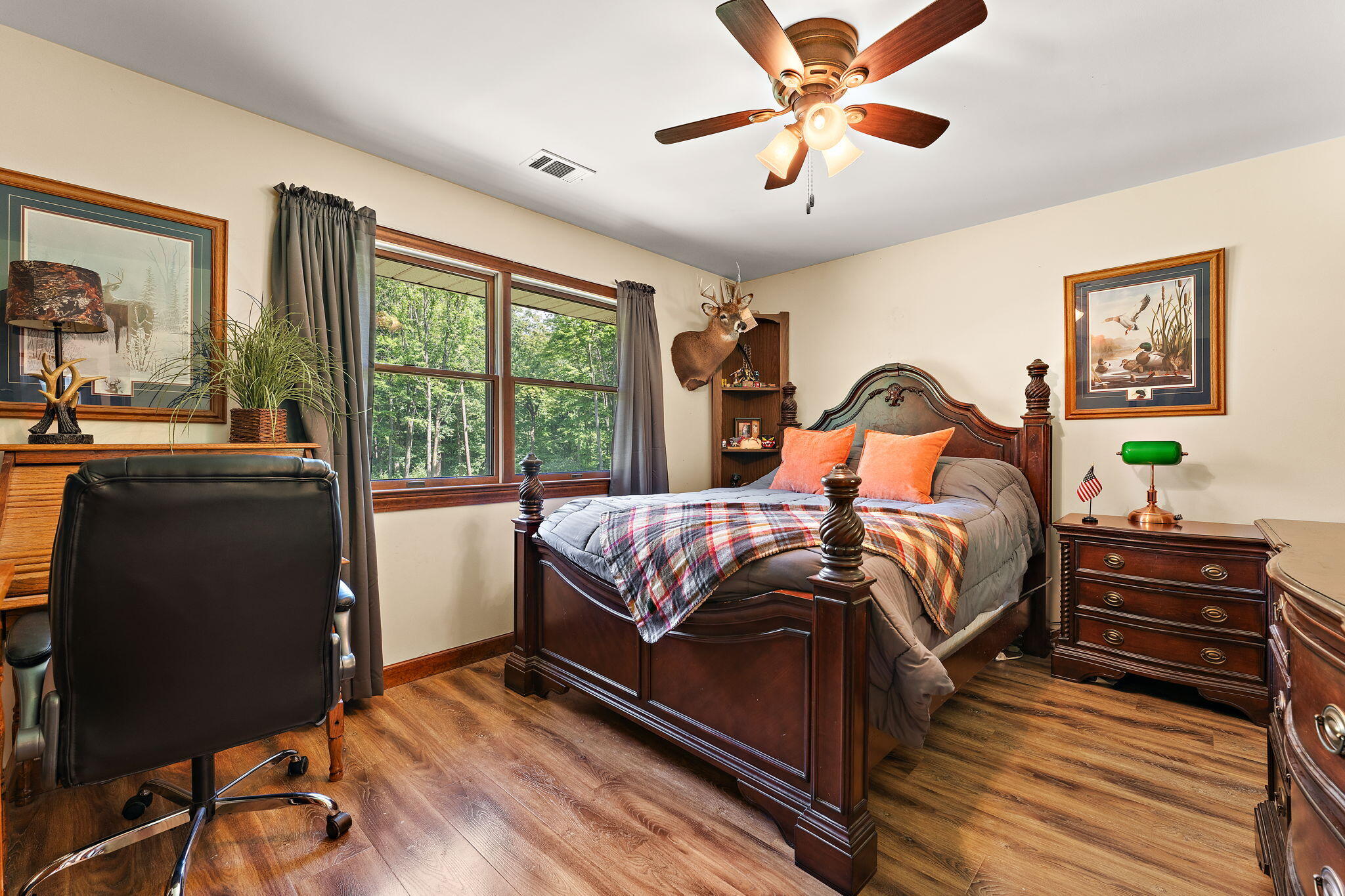 249 West 700 North Valparaiso, IN 46385 - Photo 21 of 46 a bedroom with a bed and a chandelier