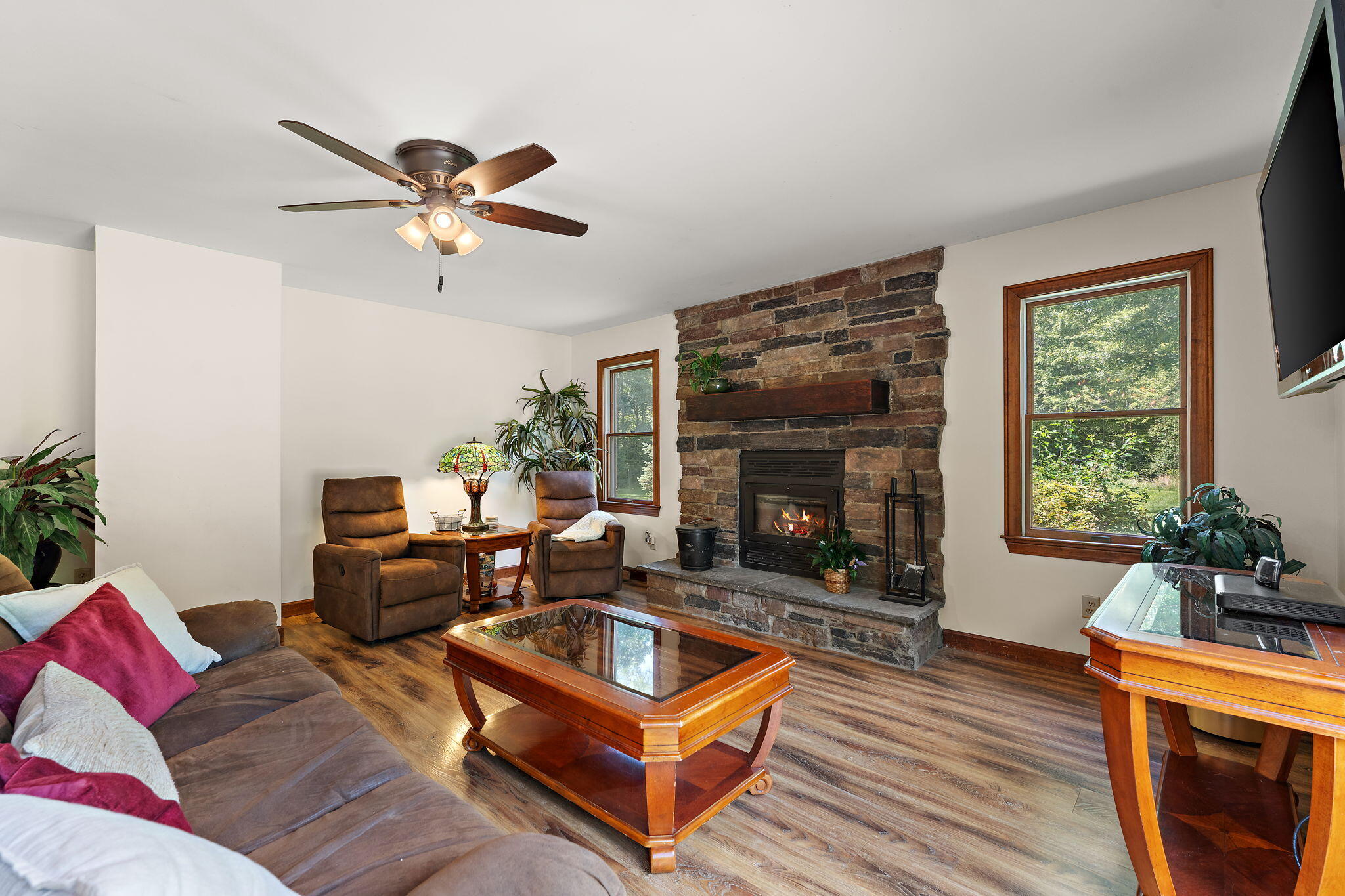 249 West 700 North Valparaiso, IN 46385 - Photo 8 of 46 a living room with furniture a fireplace and a window