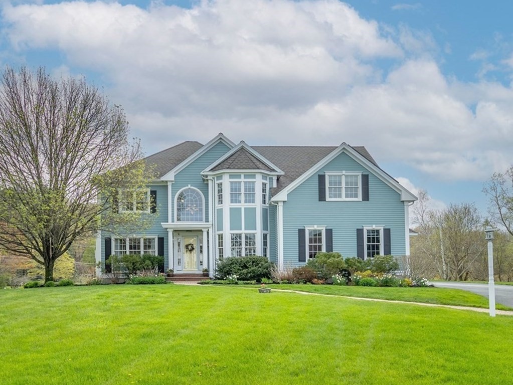 2 Hay Bale Road Andover, MA 01810 - Photo 1 of 42 a front view of a house with a yard