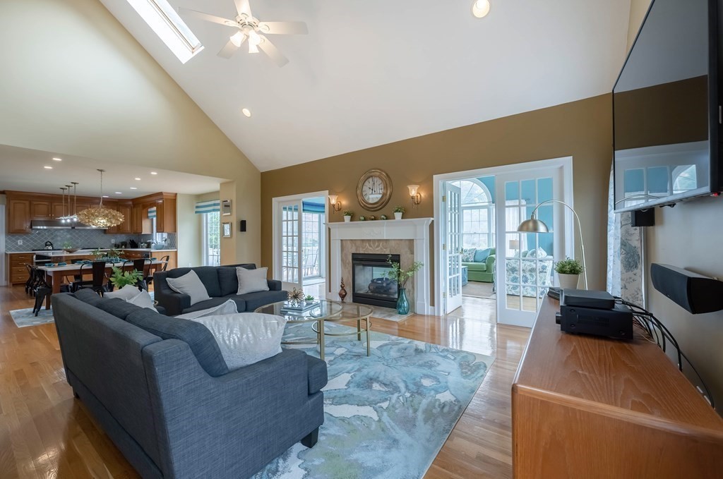 2 Hay Bale Road Andover, MA 01810 - Photo 12 of 42 a living room with furniture and a fireplace