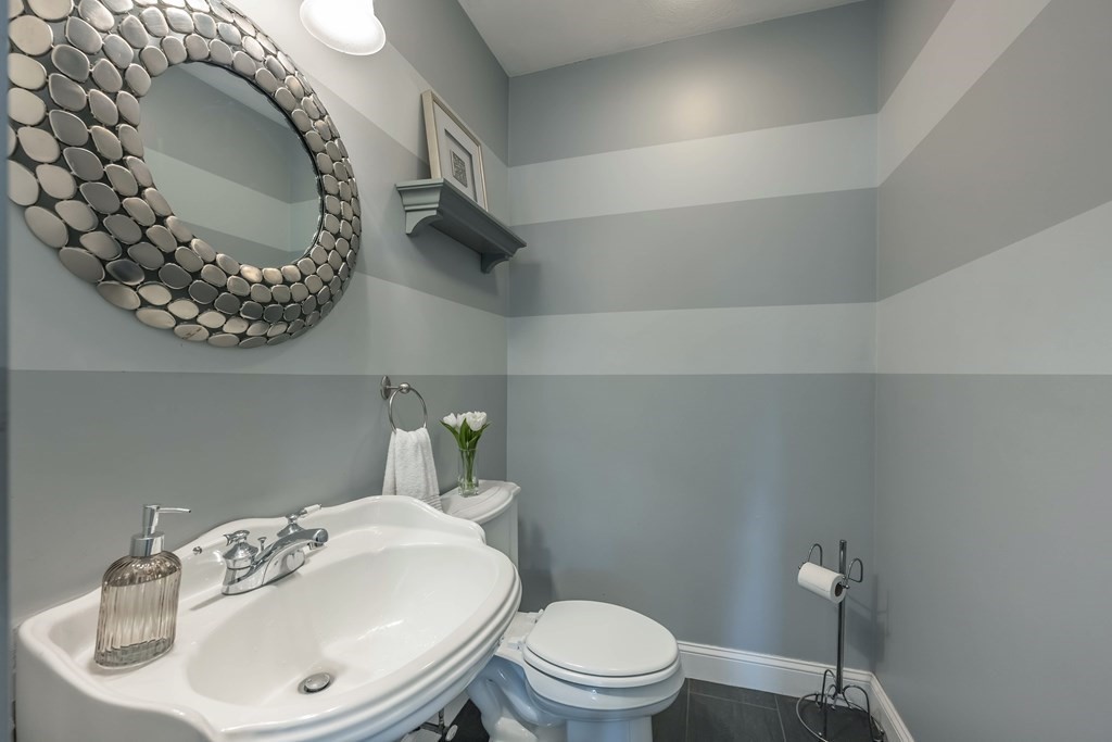 2 Hay Bale Road Andover, MA 01810 - Photo 17 of 42 a bathroom with a toilet sink and mirror