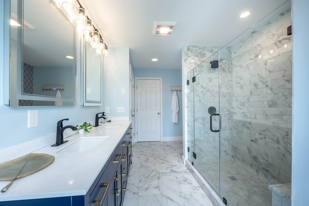 2 Hay Bale Road Andover, MA 01810 - Photo 23 of 42 a bathroom with a granite countertop sink a toilet and shower