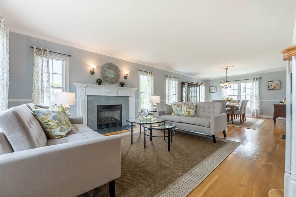 2 Hay Bale Road Andover, MA 01810 - Photo 4 of 42 a living room with furniture and a fireplace
