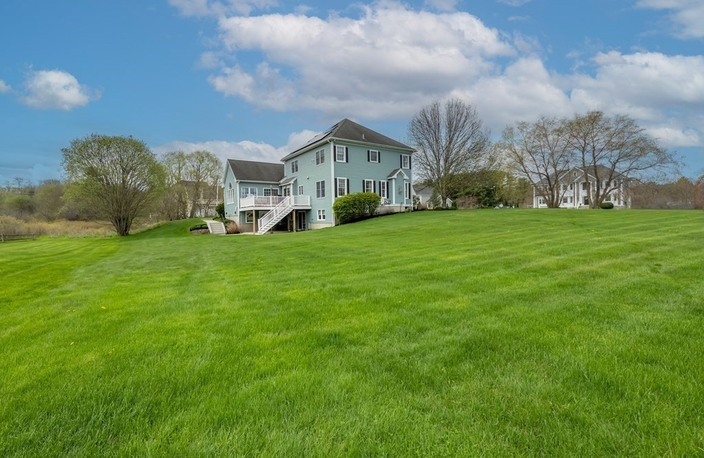 2 Hay Bale Road Andover, MA 01810 - Photo 42 of 42 a view of a big house with a big yard and large trees