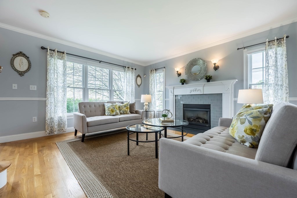 2 Hay Bale Road Andover, MA 01810 - Photo 5 of 42 a living room with furniture and a fireplace