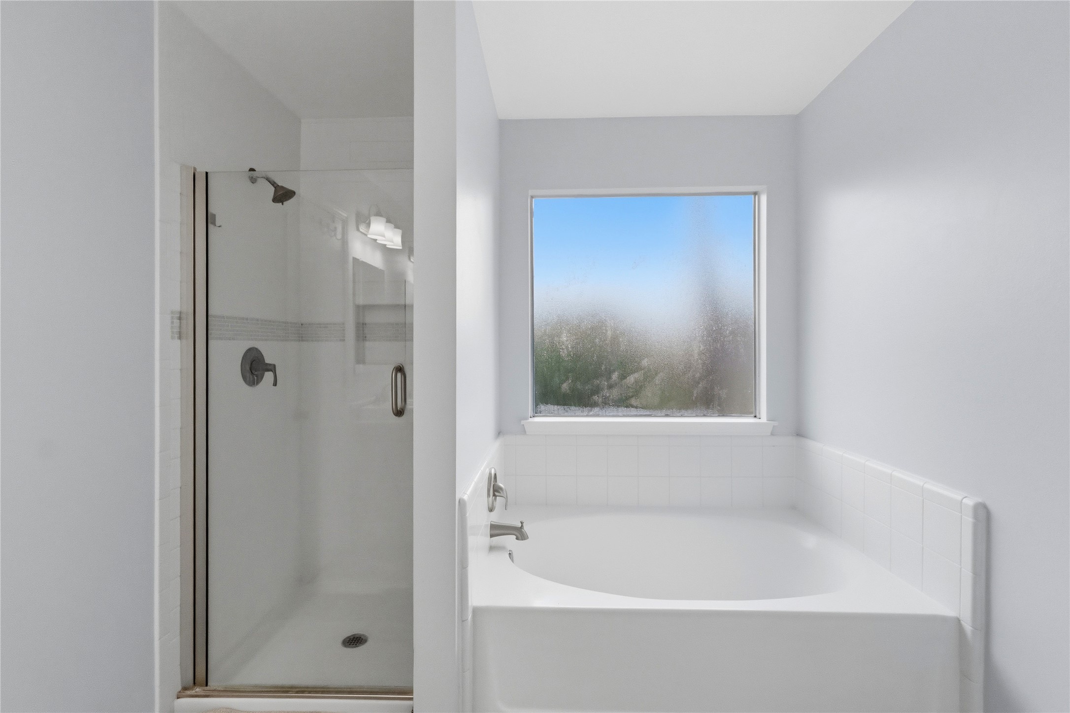 2703 Hidden Spring Vale Drive Spring, TX 77386 - Photo 18 of 29 Bathroom offers a separate sunken tub providing a serene spot for relaxation.