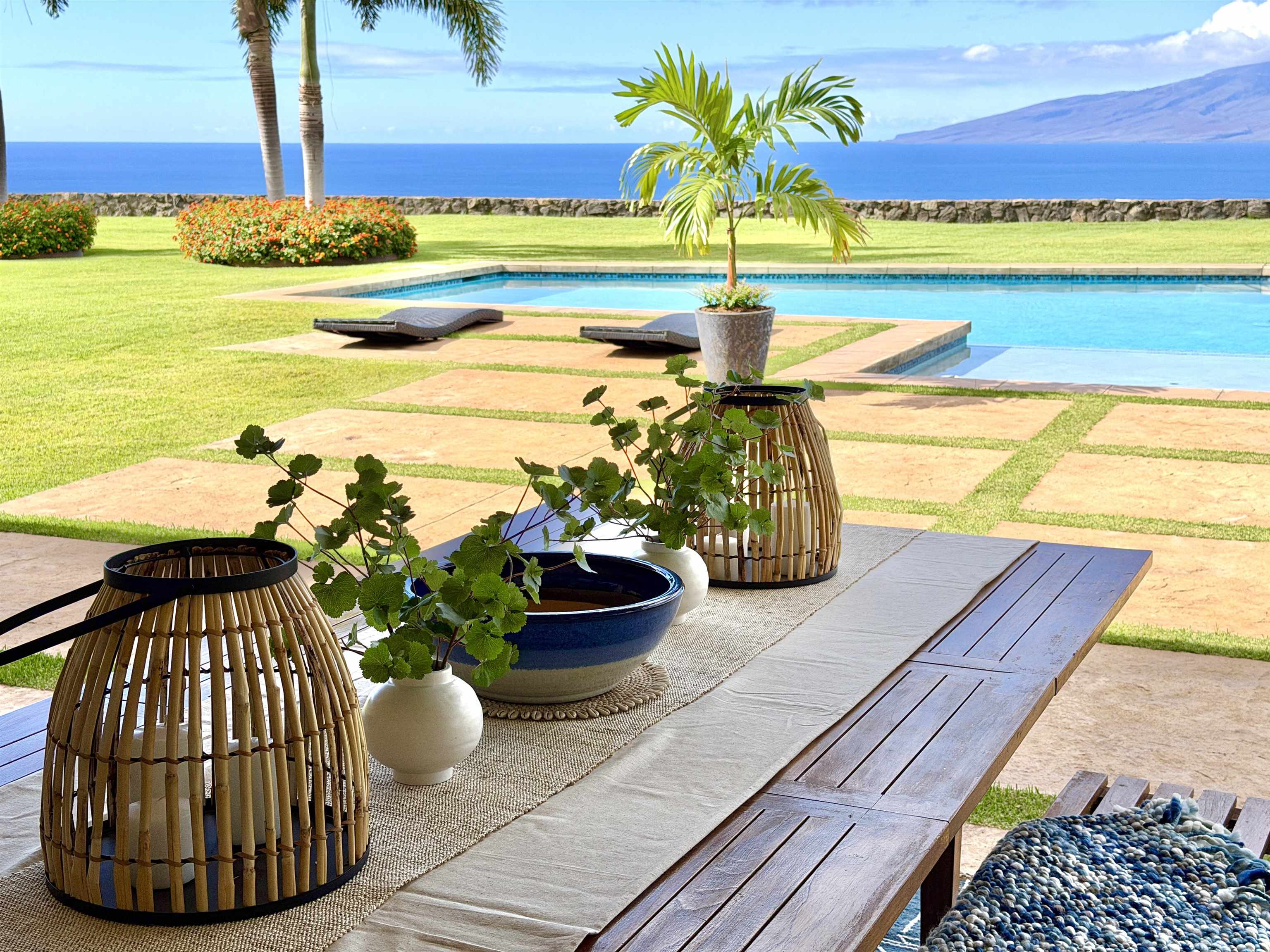 123 Punakea Loop, Unit A Lahaina, HI 96761 - Photo 11 of 50 a view of a swimming pool with a lounge chair