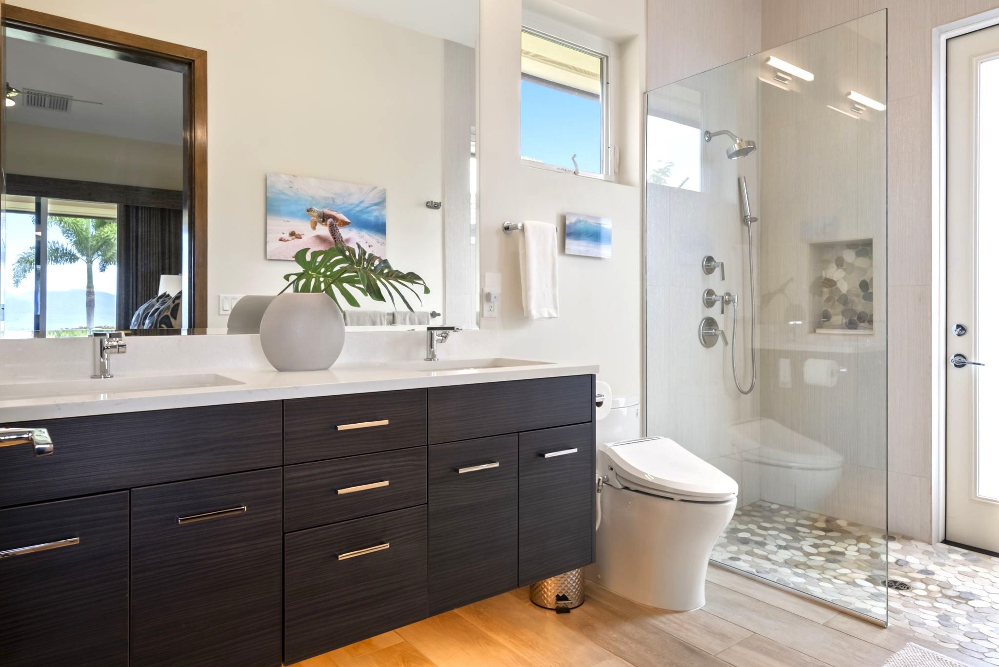 123 Punakea Loop, Unit A Lahaina, HI 96761 - Photo 21 of 50 a bathroom with a sink toilet a mirror and shower