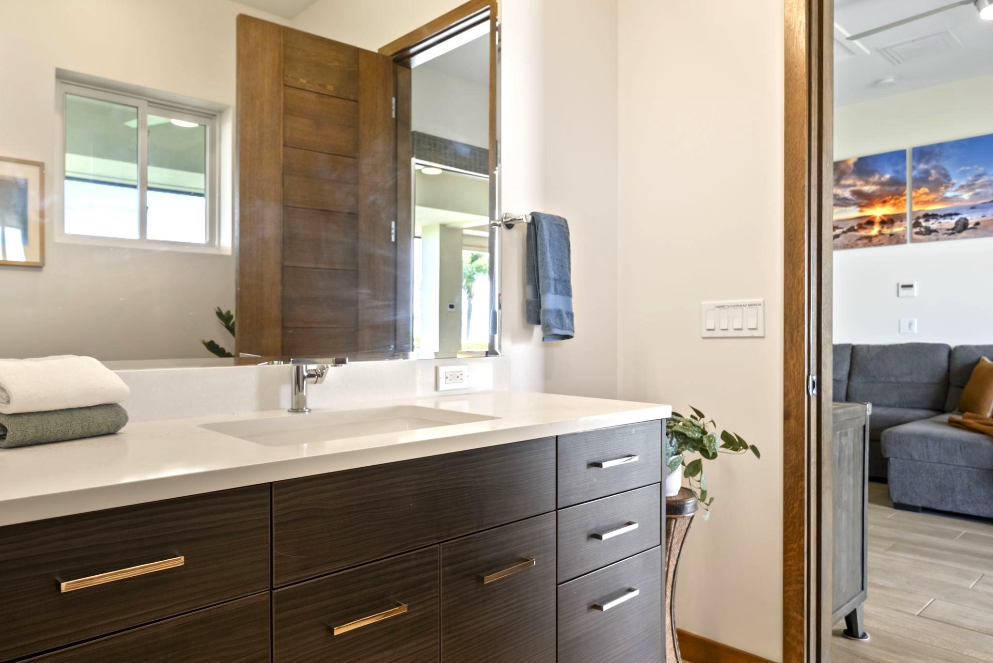 123 Punakea Loop, Unit A Lahaina, HI 96761 - Photo 29 of 50 a bathroom with a sink and a mirror