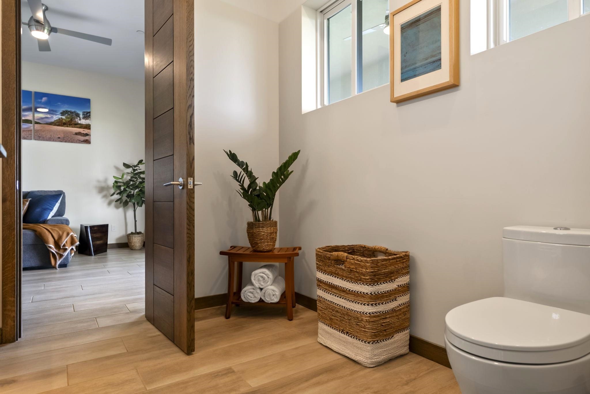 123 Punakea Loop, Unit A Lahaina, HI 96761 - Photo 30 of 50 a bathroom with a toilet and a potted plant