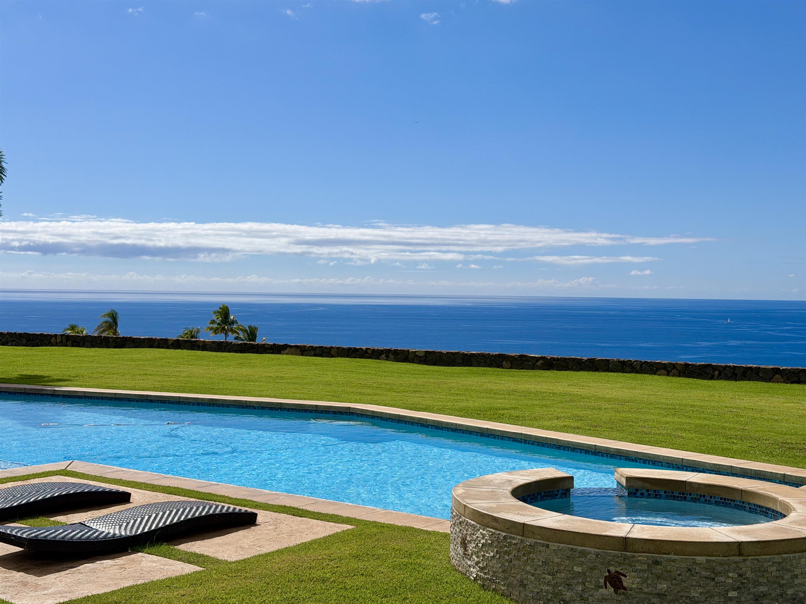 123 Punakea Loop, Unit A Lahaina, HI 96761 - Photo 3 of 50 a view of swimming pool with a lounge chair