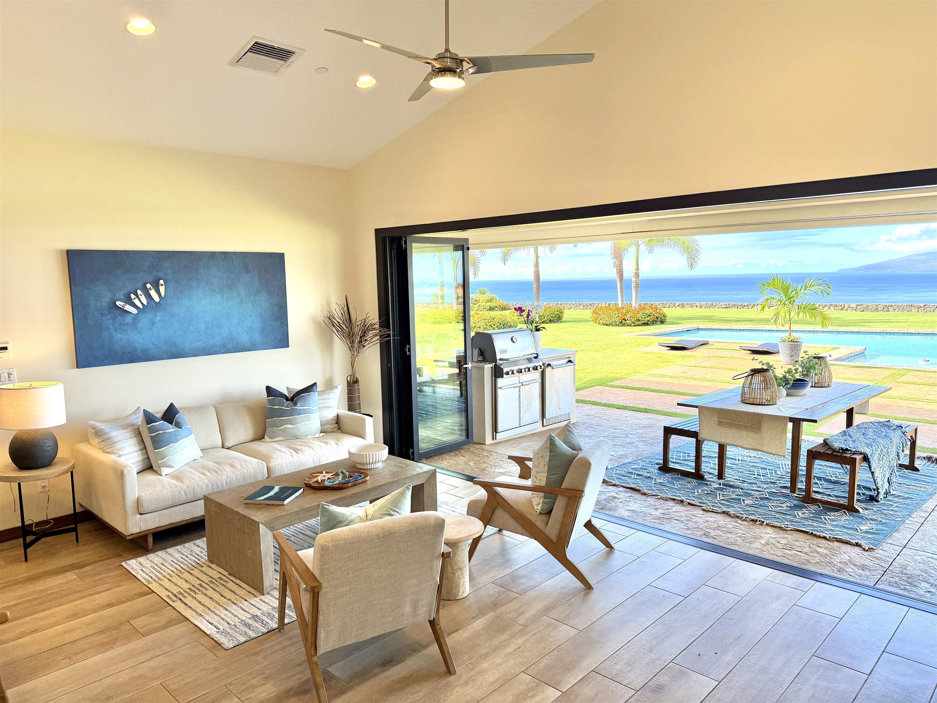 123 Punakea Loop, Unit A Lahaina, HI 96761 - Photo 9 of 50 a living room with furniture and floor to ceiling window