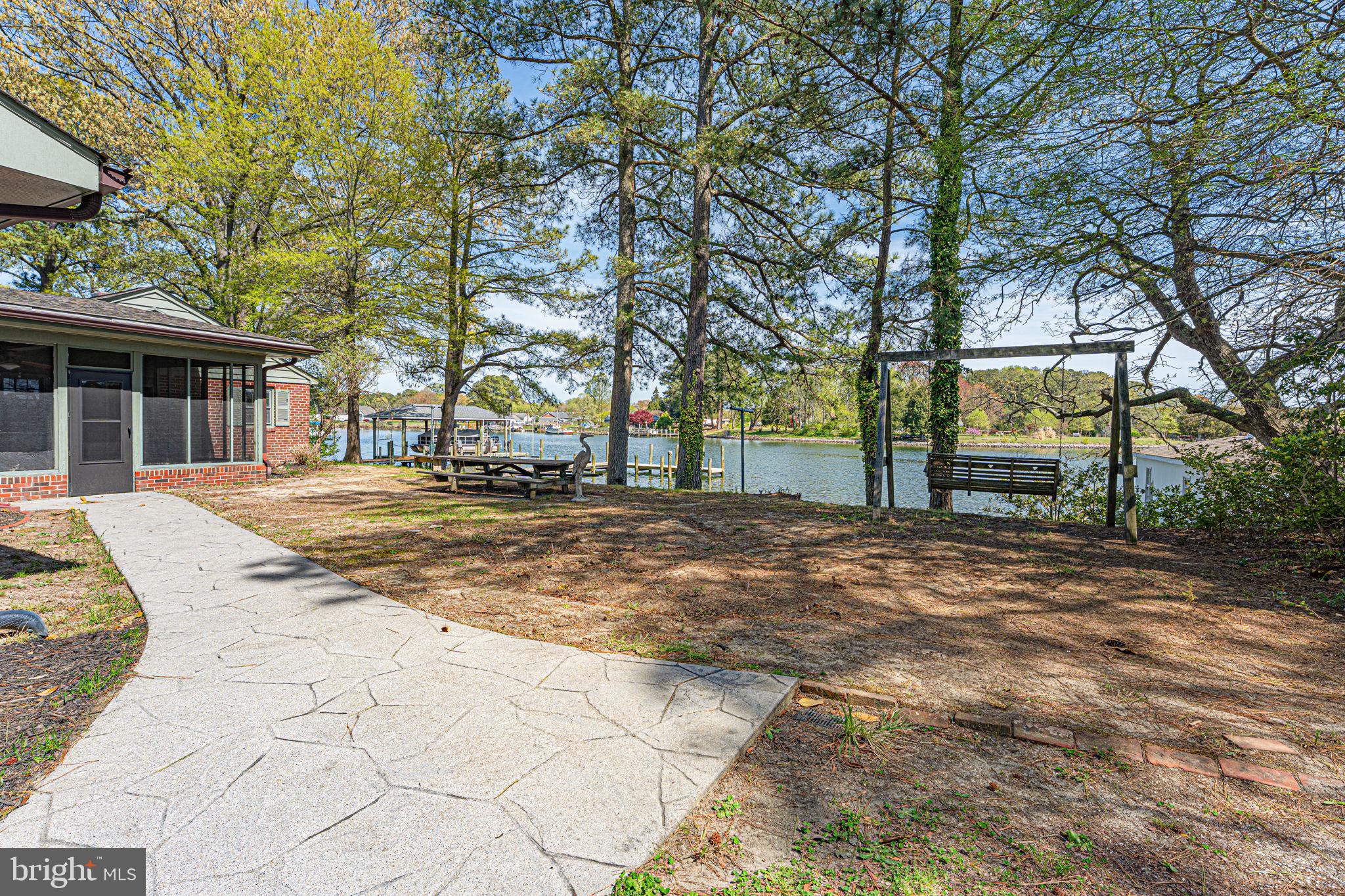 137 Pine Drive Reedville, VA 22539 - Photo 32 of 36 a view of outdoor space with trees