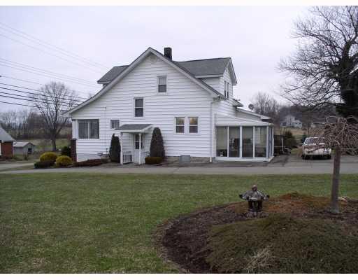1834 Eastbrook Road New Castle, PA 16101 - Photo 17 of 18 Exterior Back. View from the side of the house.
