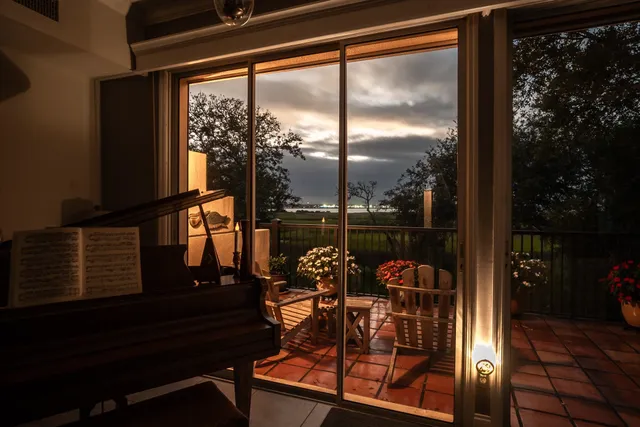 a aerial view of a house with a yard